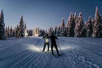 Skiing in forest at night (Source: Getty Images) 