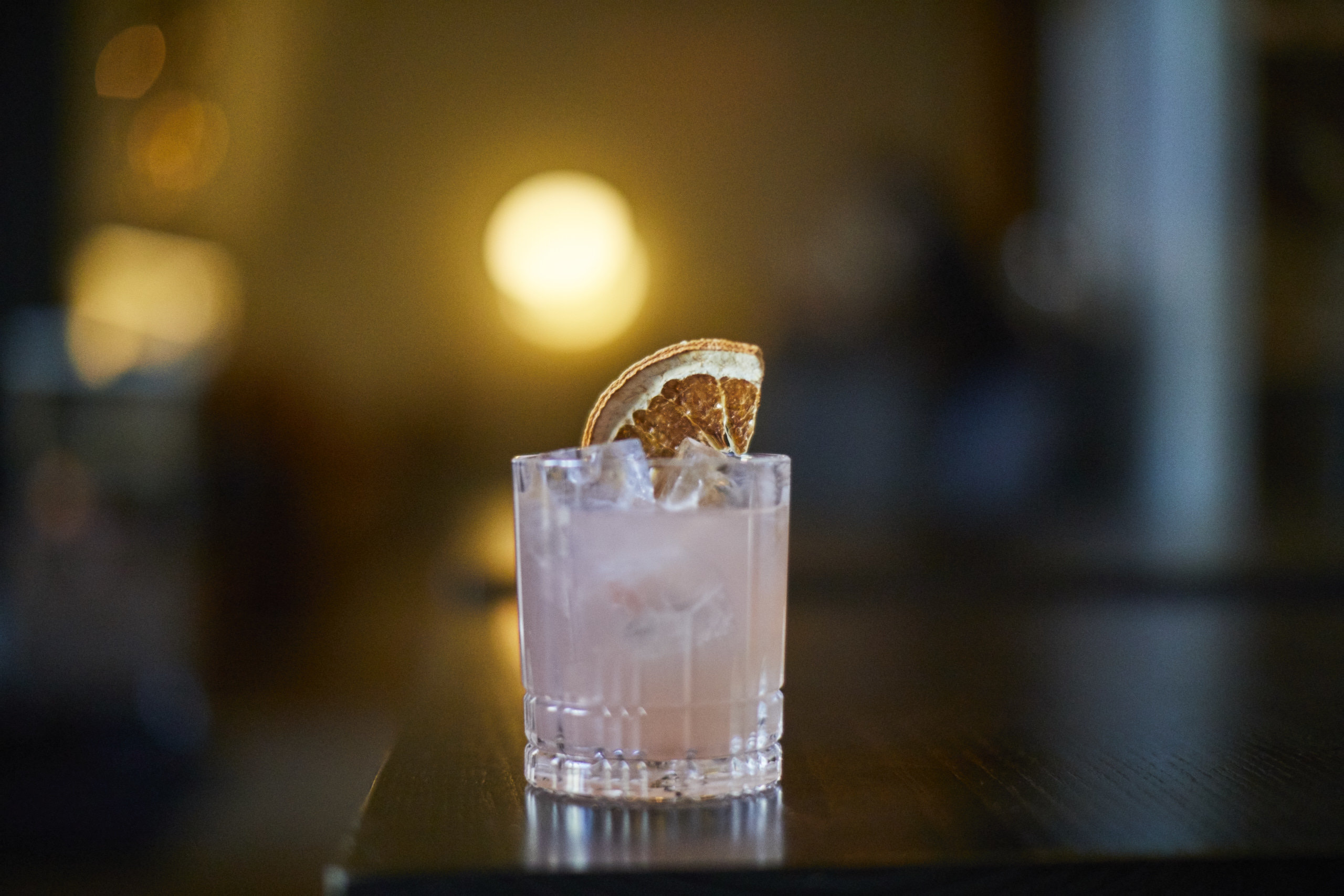 Expect to see more drinks with dehydrated garnishes as bars work to reduce waste. Pictured: Cocktail from Henley at Kimpton Aertson in Nashville, Tenn. Photo Courtesy: Emily Hall