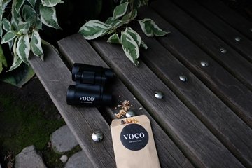 Voco binoculars birdseed outdoors
