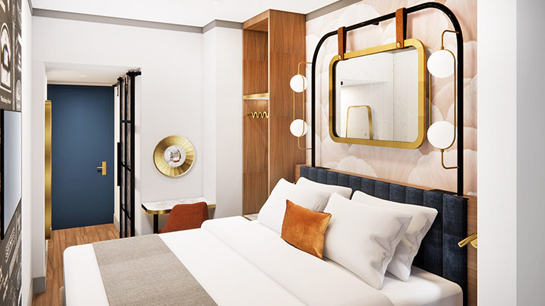 Guest room views of voco Times Square – Broadway, featuring design inspired by New York City’s Prohibition-era speakeasies, blending sleek lines, rich textures, and stylish furnishings