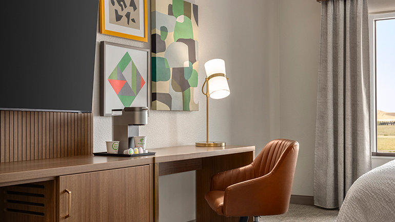 Dedicated workspace and modern design in guestroom at Holiday Inn & Suites Commerce City-Denver Airport by IHG
