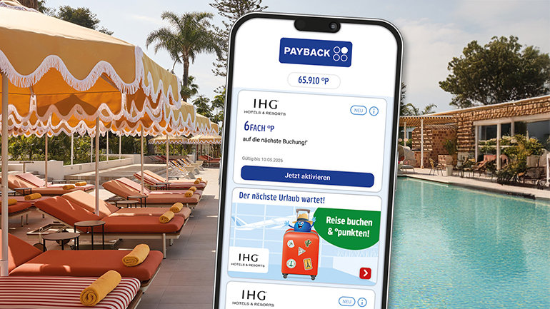 Mobile phone screen showing IHG hotel booking options with PAYBACK points, positioned in front of the outdoor pool area with sun loungers and parasols at Kimpton Los Monteros Marbella.