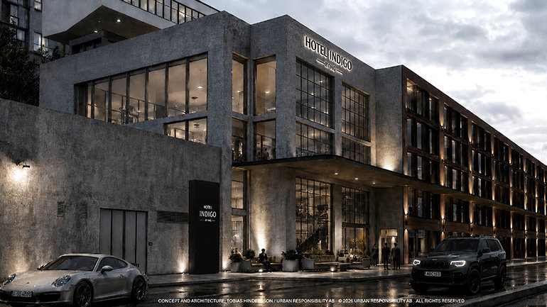 Exterior architectural render of a Hotel Indigo by IHG property at dusk. The building features a modern industrial design with raw concrete façades, expansive floor-to-ceiling glass windows revealing warmly lit interiors, and black-framed detailing. Illuminated "Hotel Indigo by IHG" signage is displayed prominently on the upper façade and at street level. The entrance is framed by a sheltered canopy with uplighting, planters, and outdoor seating. Two cars are parked on the wet street in front of the hotel. Concept and architecture by Tobias Hindersson / Urban Responsibility AB.